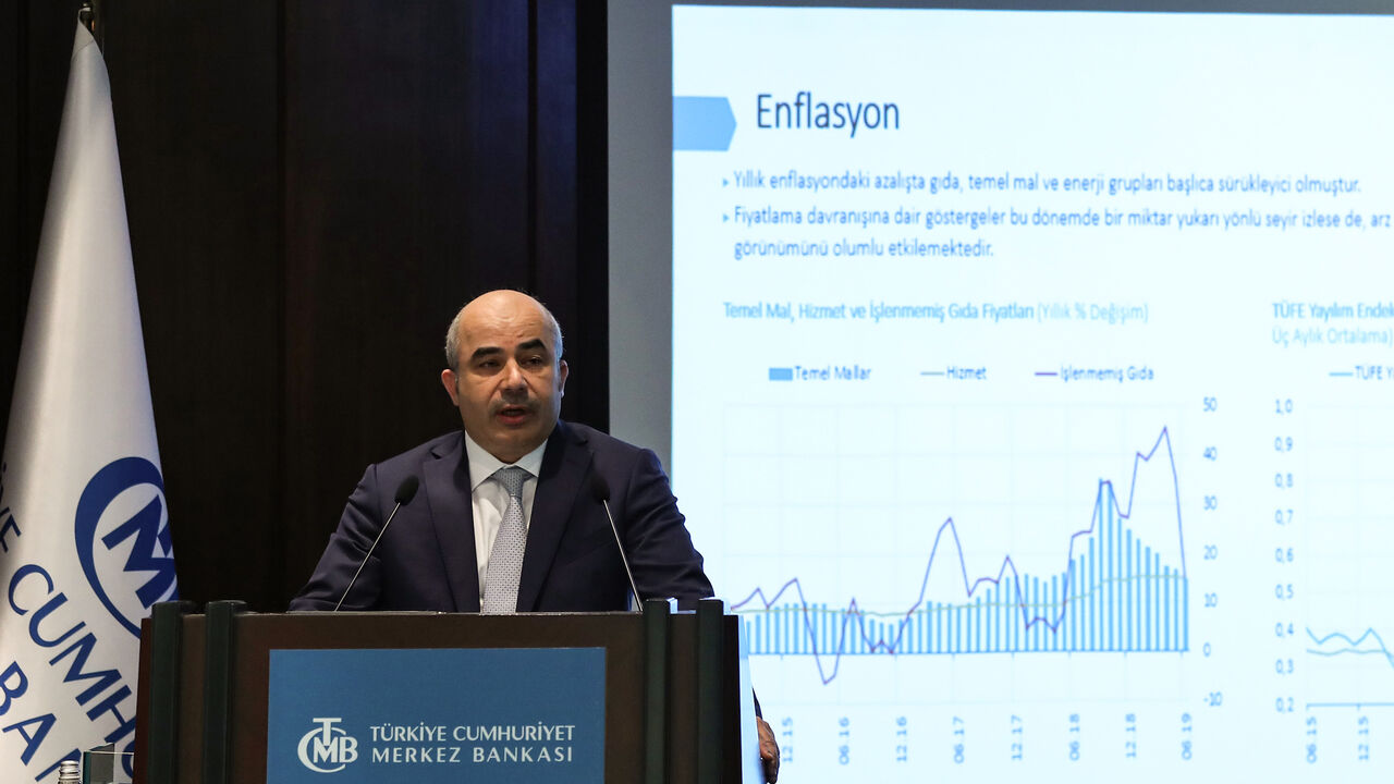 1158782763 Governor of Central Bank of the Republic of Turkey (CBRT), Murat Uysal presents the Inflation Report during a press conference, in Ankara, on July 31, 2019. (Photo by Adem ALTAN / AFP) (Photo credit should read ADEM ALTAN/AFP via Getty Images)