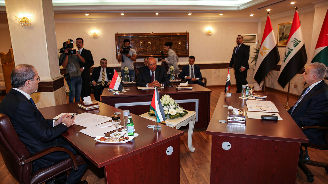 1159508827 (L to R) Jordanian Foreign Minister Ayman Safadi, Egyptian Foreign Minister Sameh Shoukry, and Iraqi Foreign Minister Mohammed Ali Hakim meet in the Iraqi capital Baghdad on August 4, 2019. (Photo by SABAH ARAR / AFP) (Photo credit should read SABAH ARAR/AFP via Getty Images)