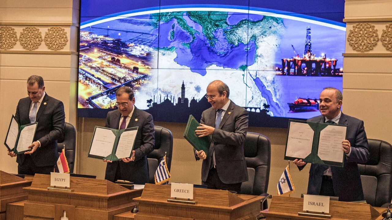 1193951784 Israeli Energy Minister Yuval Steinitz (R), Greece's Energy Minister Kostis Hatzidakis (2nd-R), Egyptian Minister of Petroleum Tarek el-Molla (2nd-L) and Cypriot Energy Minister Yiorgos Lakkotrypis (L) attend the East Mediterranean Gas Forum (EMGF), in Cairo, on January 16, 2020. - Israel began pumping natural gas to Egypt for the first time yesterday under a $15 billion, 15-year deal to liquefy it and re-export it to Europe. It is the first time that Egypt, which in 1979 became the first Arab country to si