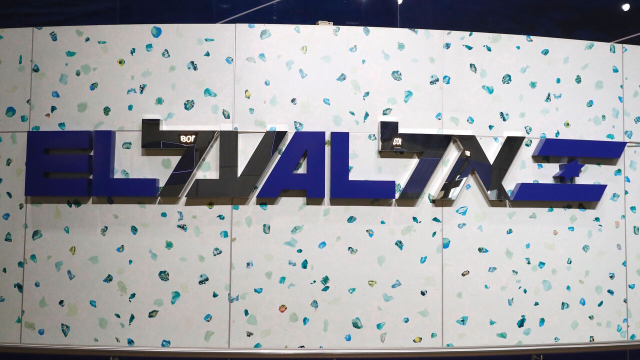 1225243738 This picture taken on July 7, 2020 shows a view of the sign showing the logo of Israeli El Al airline, at the check-in counter at Israel's Ben Gurion Airport in Lod, east of Tel Aviv. - Israeli airline El Al said on July 6 it had agreed to a government bailout that could pave the way for the carrier's renationalisation, after losses linked to the novel coronavirus pandemic. The plan also reportedly involves a stock offering, with the government agreeing to absorb any stock left unsold from that offering. (P