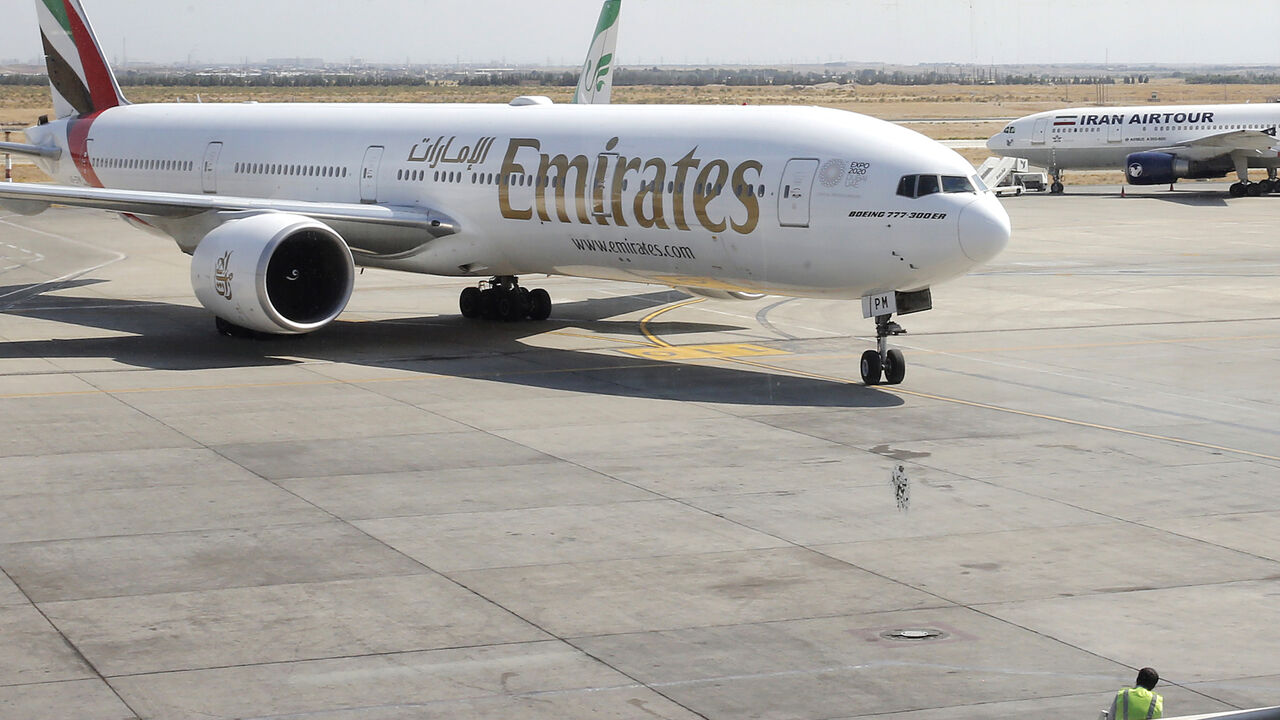 1227661120 This picture taken on July 17, 2020 shows an Emirates Boeing 777-31H aircraft taxying upon arrival at the Iranian capital Tehran's Imam Khomeini International Airport. - The UAE's Emirates airlines landed its first flight in Tehran on July 17 after a five month shutdown due to the novel coronavirus pandemic. (Photo by - / AFP) (Photo by -/AFP via Getty Images)