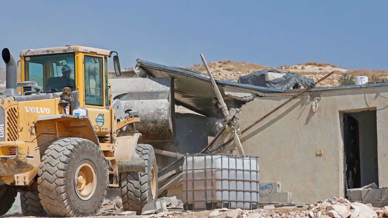1228310362 Israeli authorities demolish a Palestinian house in the southern West Bank village of Khirbet Jinba on September 2, 2020, since it was reportedly built in "Area C" without Israeli authorisation. - "Area C" is a stretch of land accounting for 60 percent of the West Bank over which Israel has control under the terms of the Oslo Accords signed between Israel and the Palestinians in the 1990s. It is extremely difficult for Palestinians to receive building permits from Israeli authorities for that area. (Photo b