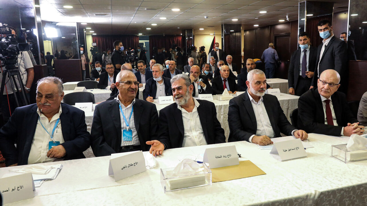 1228329280 (L to R) Deputy Secretary-General of the Popular Front for the Liberation of Palestine (PFLP) Abu Ahmad Fuad, Assistant Secretary-General of the Popular Front for the Liberation of Palestine-General Command (PFLP-GC) Talal Naji, Secretary-General of the Islamic Jihad Movement in Palestine Ziad al-Nakhala, Hamas chief Ismail Haniyeh, and Deputy Secretary-General of the Democratic Front for the Liberation of Palestine (DFLP) Fahd Suleiman attend a meeting with representatives of other Palestinian factions at