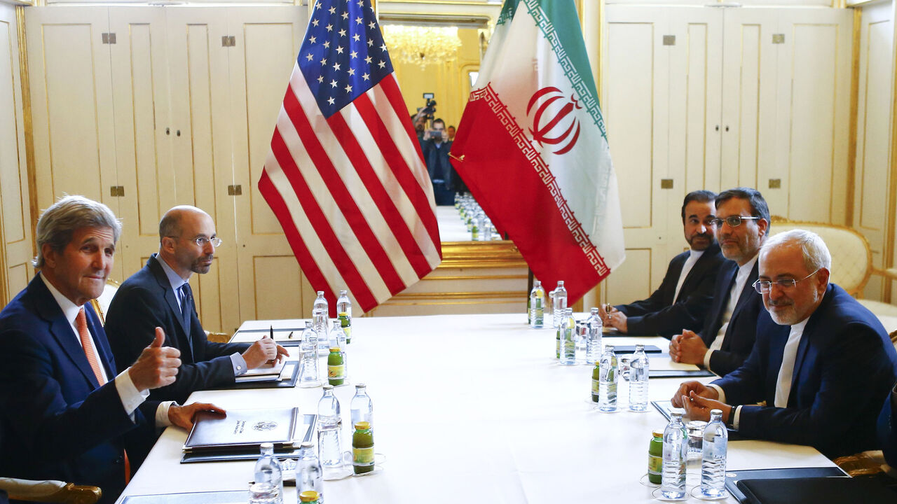 531887868 US Secretary of State John Kerry (L) and Iran's Foreign Minister Mohammad Javad Zarif attend a bilateral meeting in Vienna, Austria, May 17, 2016.
/ AFP / POOL / LEONHARD FOEGER (Photo credit should read LEONHARD FOEGER/AFP via Getty Images)