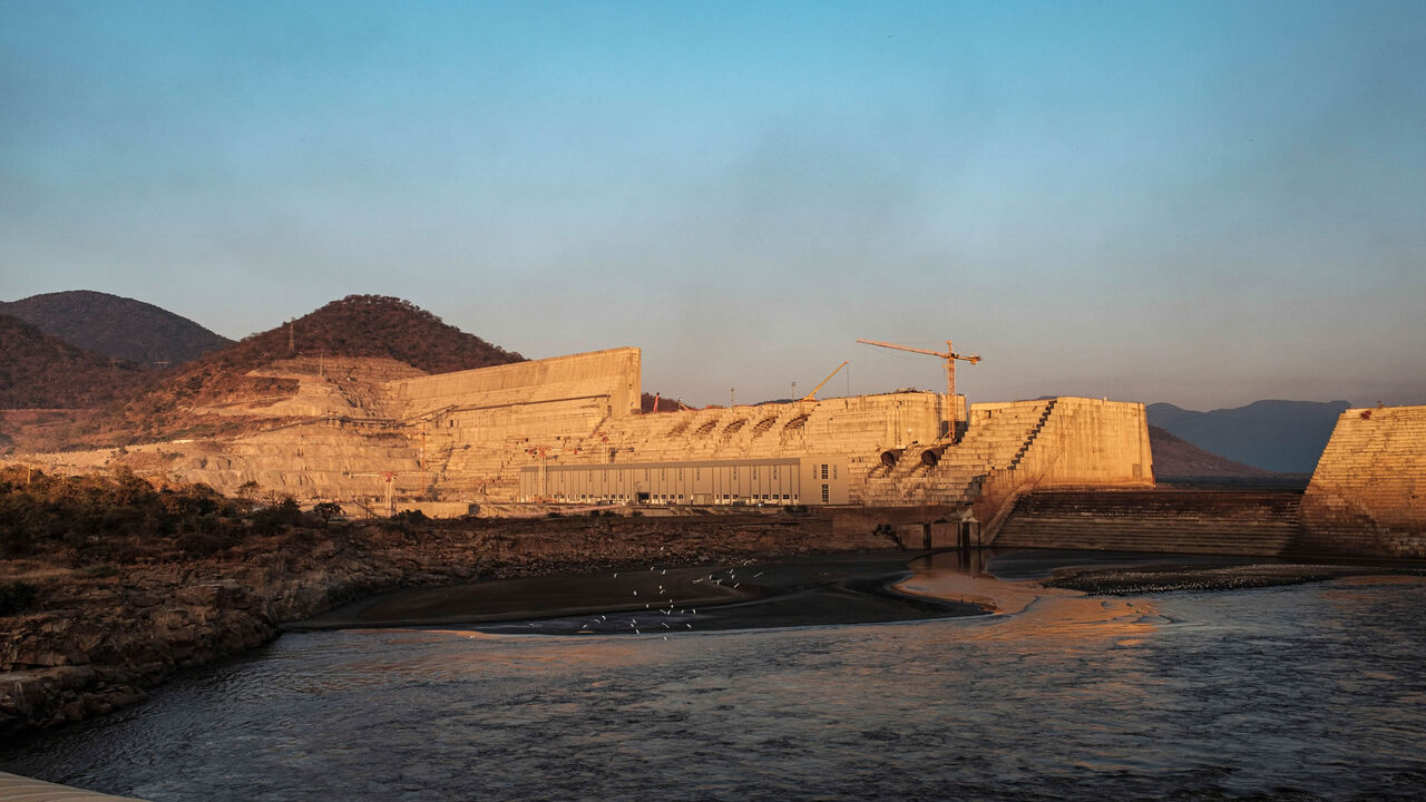 1192325440 A general view of the the Grand Ethiopian Renaissance Dam (GERD), near Guba in Ethiopia, on December 26, 2019. - The Grand Ethiopian Renaissance Dam, a 145-metre-high, 1.8-kilometre-long concrete colossus is set to become the largest hydropower plant in Africa.
Across Ethiopia, poor farmers and rich businessmen alike eagerly await the more than 6,000 megawatts of electricity officials say it will ultimately provide.
Yet as thousands of workers toil day and night to finish the project, Ethiopian negotiators