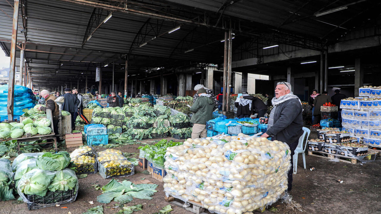1198072700 This picture taken on February 2, 2020 shows a view of a produce market in the occupied West Bank Palestinian city of Nablus, following the announcement of Israeli Defence Minister Naftali Bennett to halt imports of all agricultural goods from the West Bank into Israel. (Photo by Jaafar ASHTIYEH / AFP) (Photo by JAAFAR ASHTIYEH/AFP via Getty Images)