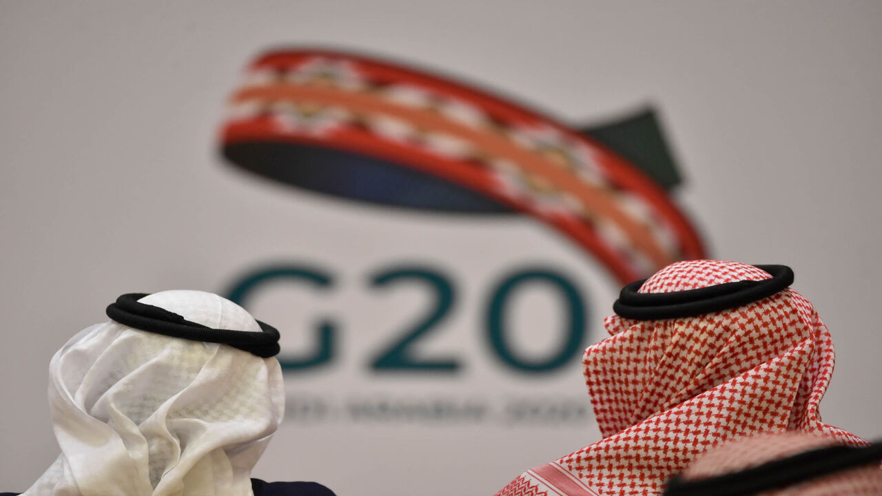 1202787920 Unidentified guests attend a meeting of Finance ministers and central bank governors of the G20 nations in the Saudi capital Riyadh on February 23, 2020. - The deadly coronavirus epidemic will dent global growth, the IMF warned, as G20 finance ministers and central bank governors weighed its economic ripple effects at a two-day gathering in Riyadh. (Photo by FAYEZ NURELDINE / AFP) (Photo by FAYEZ NURELDINE/AFP via Getty Images)