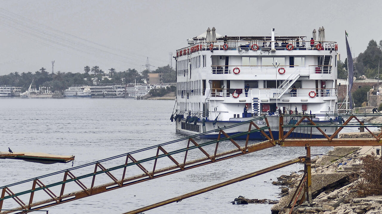 1206172910 This picture taken on March 9, 2020 shows a view of the "A Sara" Nile cruise ship moored off the river bank of Egypt's southern city of Luxor, where 45 suspected COVID-19 coronavirus disease cases were detected and evacuated two days prior. - Egypt on March 8 reported the country's -- and Africa's -- first fatality from the virus, a 60-year-old German tourist who died in a Red Sea resort in eastern Egypt. The following day, Egypt's health ministry said the total number of known cases had risen to 55. Scores