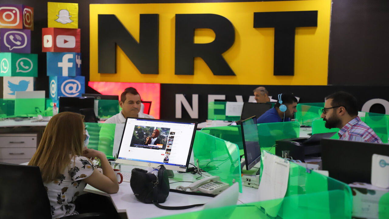 1228163935 Journalists are pictured in the newsroom of Nalia Radio and Television (NRT) in Sulaimaniyah city, in the Kurdish autonomous region of northern Iraq on August 22, 2020. - Kurdish authorities in northern Iraq are escalating their crackdown on media outlets covering anti-government protests, journalists and rights defenders told AFP, shattering the region's reputation as a liberal refuge. (Photo by Shwan MOHAMMED / AFP) (Photo by SHWAN MOHAMMED/AFP via Getty Images)