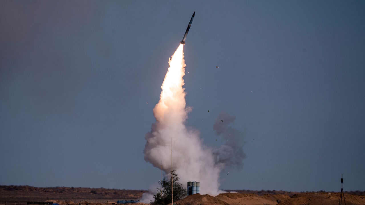 1228649455 A rocket launches from a S-400 missile system at the Ashuluk military base in Southern Russia on September 22, 2020 during the "Caucasus-2020" military drills gathering China, Iran, Pakistan and Myanmar troops, along with ex-Soviet Armenia, Azerbaijan and Belarus. - Up to 250 tanks and around 450 infantry combat vehicles and armoured personnel carriers will take part in the September 21 to 26 land and naval exercises that will involve 80,000 people including support staff. (Photo by Dimitar DILKOFF / AFP) (