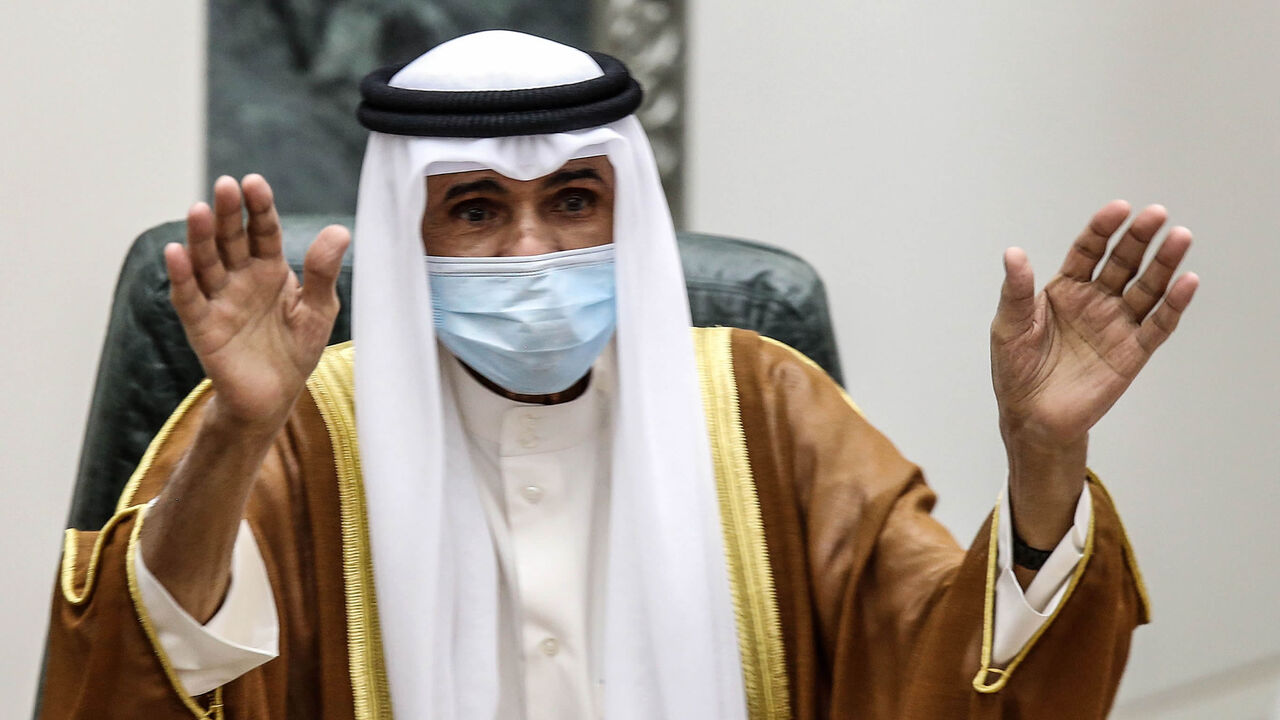 1228798929 Sheikh Nawaf al-Ahmad Al-Sabah salutes the crowd after being sworn in as Kuwait's new Emir at the National Assembly in Kuwait City on September 30, 2020. - Kuwait today swore in its new emir, Sheikh Nawaf al-Ahmad Al-Sabah, after the death of his half-brother, Sheikh Sabah, who died in the US at the age of 91. (Photo by Yasser Al-Zayyat / AFP) (Photo by YASSER AL-ZAYYAT/AFP via Getty Images)