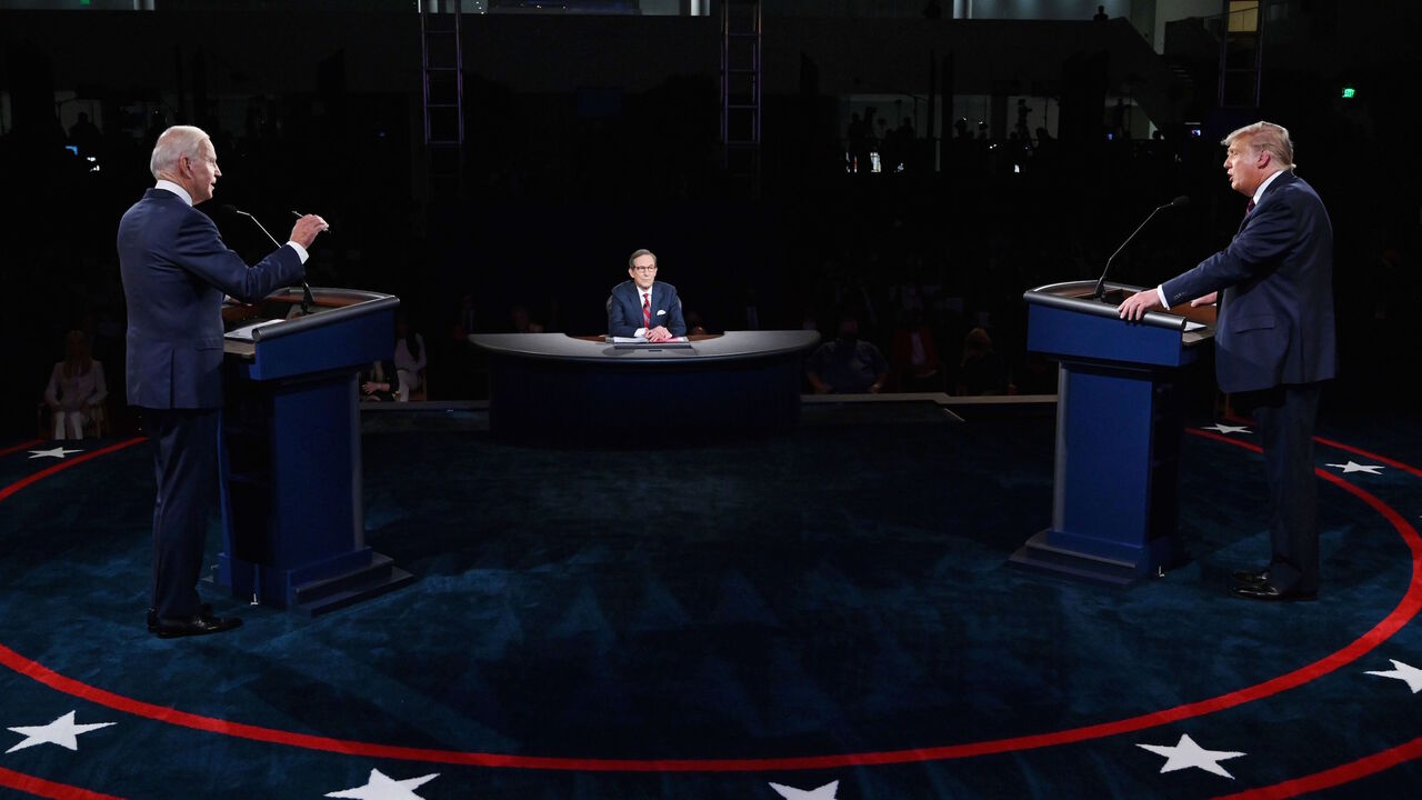 1228848010 US President Donald Trump (R) and Democratic presidential candidate Joe Biden participate in the first presidential debate at the Health Education Campus of Case Western Reserve University on September 29, 2020 in Cleveland, Ohio. - Biden said on October 2, 2020, he has tested negative for Covid-19, three days after his debate with Trump, who has contracted the illness. Trump's positive diagnosis was announced in the early hours of Friday after one of his senior aides, Hope Hicks, tested positive. (Photo by