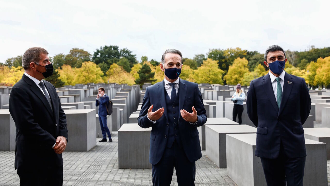 1228923173 (L-R) Israeli Foreign Minister Gabi Ashkenazi, German Foreign Minister Heiko Maas and UAE Foreign Minister Sheikh Abdullah bin Zayed al-Nahyan pose as they visit the Holocaust memorial prior to their historic meeting in Berlin, on October 6, 2020. (Photo by MICHELE TANTUSSI / POOL / AFP) (Photo by MICHELE TANTUSSI/POOL/AFP via Getty Images)