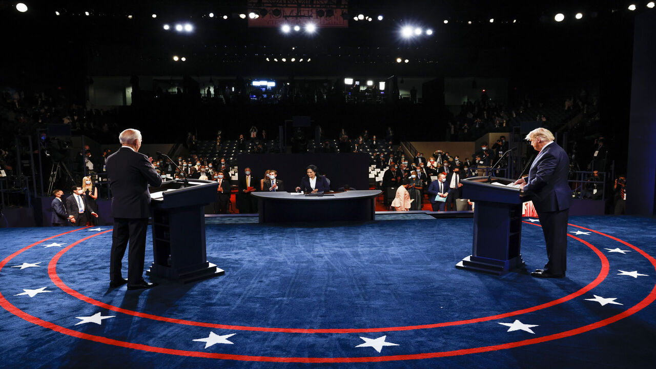 1229229389 NASHVILLE, TENNESSEE - OCTOBER 22: U.S. President Donald Trump and Democratic presidential nominee Joe Biden participate in the final presidential debate at Belmont University on October 22, 2020 in Nashville, Tennessee. This is the last debate between the two candidates before the November 3 election. (Photo by Jim Bourg-Pool/Getty Images)