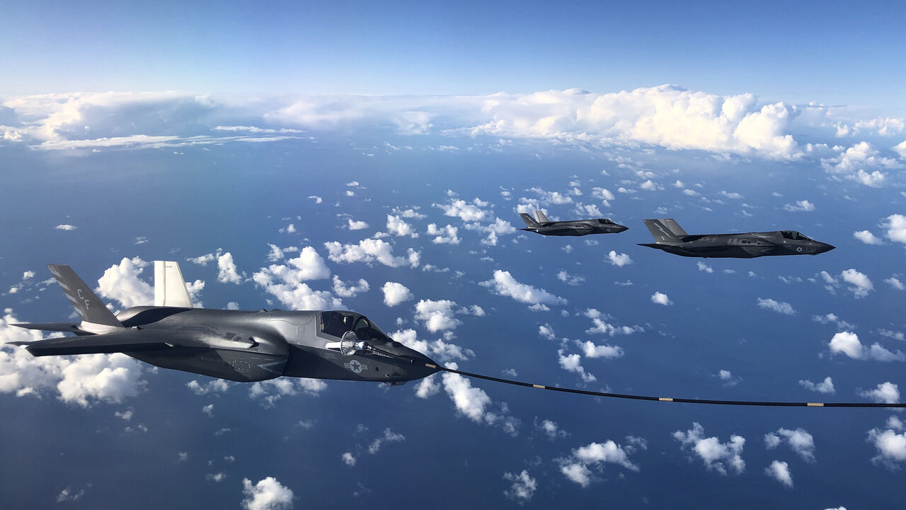 1279187582 IN FLIGHT, SCOTLAND - OCTOBER 08: An F-35B combat aircraft from the United States Marine Corp refuels from an RAF Voyager aircraft over the North Sea on October 08, 2020 in flight, above Scotland. The first air-to-air refuelling of F-35Bs from the newly-formed Carrier Strike Group took place as part of Operation Joint Warrior. Flying from HMS Queen Elizabeth, the RAF, RN and USMC Pilots (USofA) were demonstrating the operational capabilities of NATO and the UK for current and future threats. Operation Joint