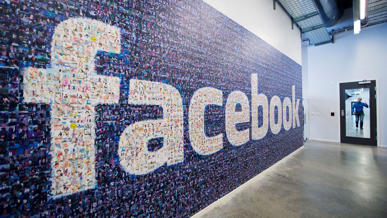 187265573 A big logo created from pictures of Facebook users worldwide is pictured in the company's Data Center, its first outside the US on November 7, 2013 in Lulea, in Swedish Lapland. The company began construction on the facility in October 2011 and went live on June 12, 2013 and are 100% run on hydro power. AFP PHOTO/JONATHAN NACKSTRAND / AFP PHOTO / JONATHAN NACKSTRAND (Photo credit should read JONATHAN NACKSTRAND/AFP via Getty Images)