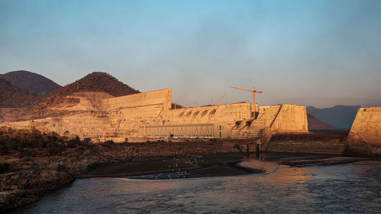 1192325440 A general view of the the Grand Ethiopian Renaissance Dam (GERD), near Guba in Ethiopia, on December 26, 2019. - The Grand Ethiopian Renaissance Dam, a 145-metre-high, 1.8-kilometre-long concrete colossus is set to become the largest hydropower plant in Africa.
Across Ethiopia, poor farmers and rich businessmen alike eagerly await the more than 6,000 megawatts of electricity officials say it will ultimately provide.
Yet as thousands of workers toil day and night to finish the project, Ethiopian negotiators