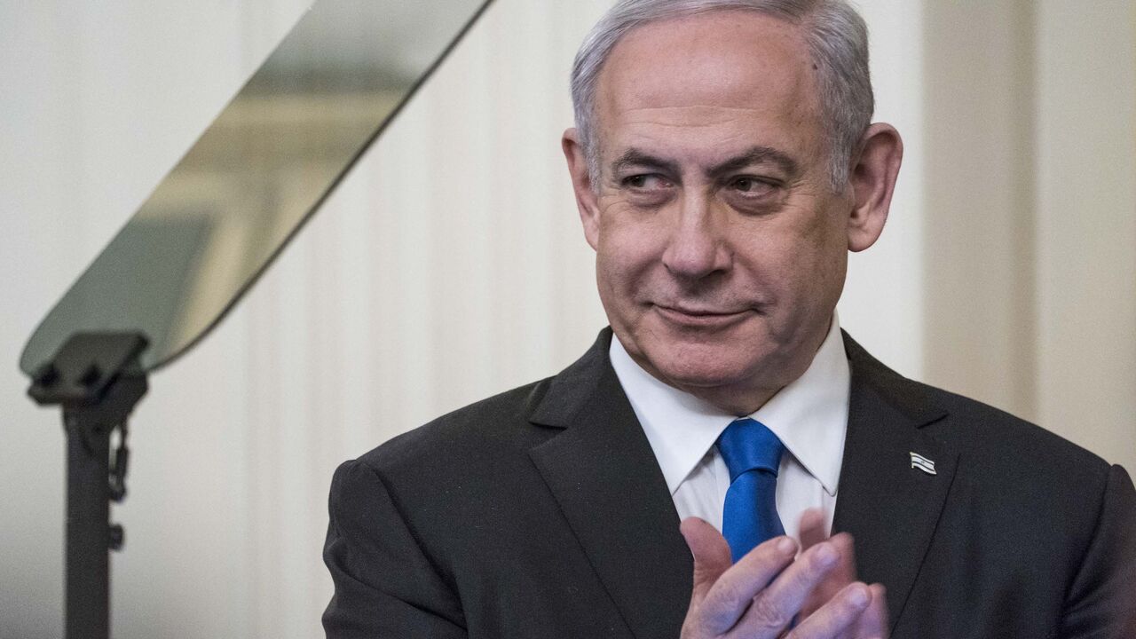 1197117561 WASHINGTON, DC - JANUARY 28: Israeli Prime Minister Benjamin Netanyahu listens as U.S. President Donald Trump speaks during a joint statement in the East Room of the White House on January 28, 2020 in Washington, DC. The news conference was held to announce the Trump administration's plan to resolve the Israeli-Palestinian conflict. (Photo by Sarah Silbiger/Getty Images)