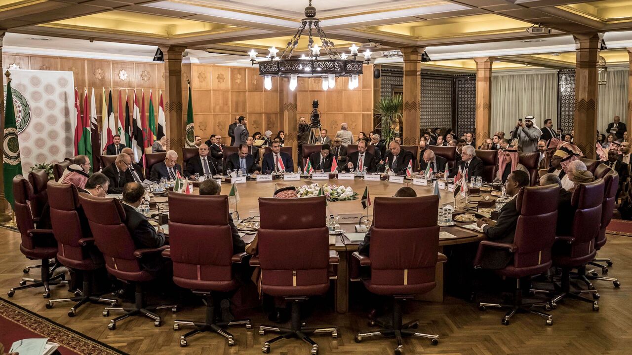 1197882740 This picture taken on February 1, 2020 shows a view at an Arab League emergency meeting discussing the US-brokered proposal for a settlement of the Middle East conflict, at the league headquarters in the Egyptian capital Cairo. - Palestinian leader Mahmud Abbas announced on February 1 a cut of all ties with Israel and the United States, including security cooperation, days after Washington unveiled a controversial Middle East peace plan. Abbas spoke at an Arab League meeting in Cairo called after US Preside