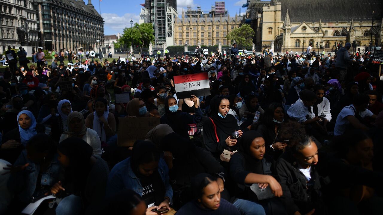 1224884275 Protesters with Yemeni flags protest in Parliament Square in London on July 5, 2020, against the continued conflict in Yemen at the same time that supporters of the Black Lives Matter movement listen to speeches in a further action in the aftermath of the death of unarmed black man George Floyd in police custody in the US. - Yemen has been locked in conflict since the Huthis took control of Sanaa in 2014 and went on to seize much of the north. The crisis escalated when the Saudi-led coalition intervened the