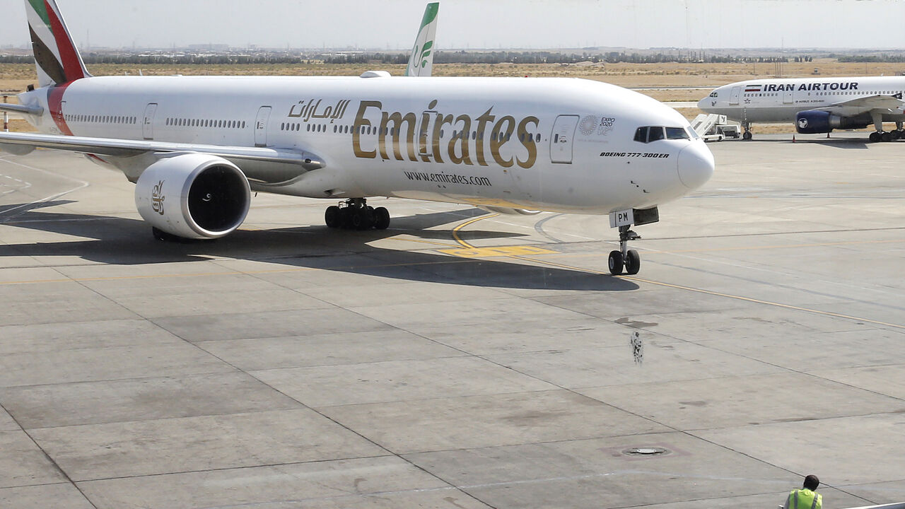 1227661120 This picture taken on July 17, 2020 shows an Emirates Boeing 777-31H aircraft taxying upon arrival at the Iranian capital Tehran's Imam Khomeini International Airport. - The UAE's Emirates airlines landed its first flight in Tehran on July 17 after a five month shutdown due to the novel coronavirus pandemic. (Photo by - / AFP) (Photo by -/AFP via Getty Images)