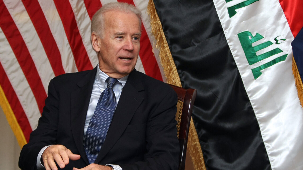 1228398071 US Vice President Joe Biden meets with General Lloyd Austin, the commander of United States Forces - Iraq (USF-I), and US ambassador in Iraq James Jeffrey at the US embassy upon the former's arrival at Baghdad on a surprise visit on November 29, 2011, during which he is due to meet top Iraqi officials, as American troops depart Iraq ahead of a year-end deadline. AFP PHOTO/AHMAD AL-RUBAYE (Photo by Ahmad AL-RUBAYE / AFP) (Photo by AHMAD AL-RUBAYE/AFP via Getty Images)