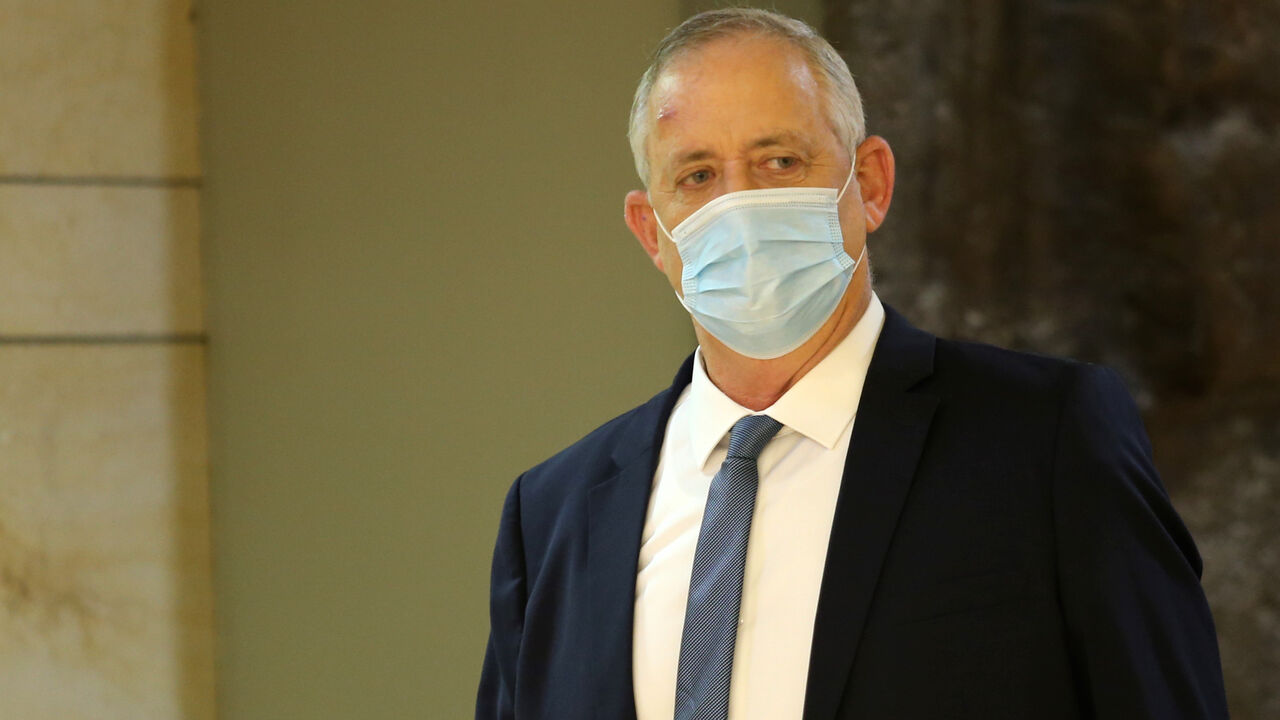 1229083031 Israeli Alternate Prime Minister Benny Gantz arrives to attend a meeting at the Knesset (Parliament) in Jerusalem on October 15, 2020. (Photo by Alex KOLOMIENSKY / POOL / AFP) (Photo by ALEX KOLOMIENSKY/POOL/AFP via Getty Images)