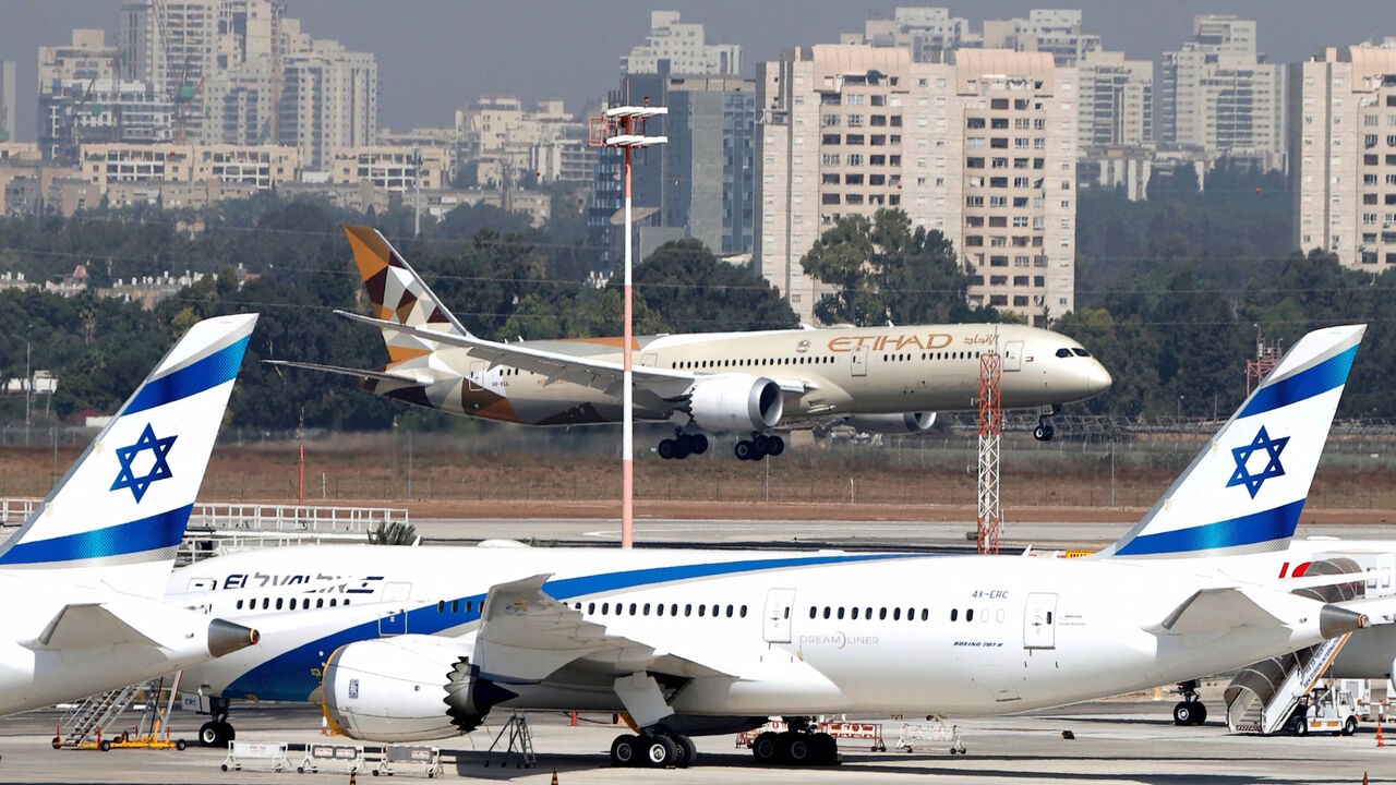 1229178906 An Etihad Airways plane carrying a delegation from the United Arab Emirates (UAE) on a first official visit, lands at Israel's Ben Gurion Airport near Tel Aviv, on October 20, 2020. - The UAE delegation left on the country's first official visit to Israel with a string of deals set to be signed after the two countries signed a deal to normalise ties last month. (Photo by JACK GUEZ / AFP) (Photo by JACK GUEZ/AFP via Getty Images)