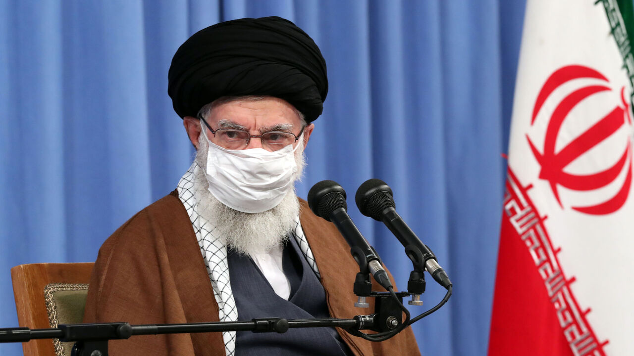 1229247599 A handout picture provided by the office of Iran's Supreme Leader Ayatollah Ali Khamenei on October 24, 2020, shows him wearing a protective face mask as he gives a speech in the capital Tehran during a meeting of the national staff to discuss the issue of the novel coronavirus pandemic crisis. (Photo by - / KHAMENEI.IR / AFP) / XGTY / === RESTRICTED TO EDITORIAL USE - MANDATORY CREDIT "AFP PHOTO / HO / KHAMENEI.IR" - NO MARKETING NO ADVERTISING CAMPAIGNS - DISTRIBUTED AS A SERVICE TO CLIENTS === (Photo by