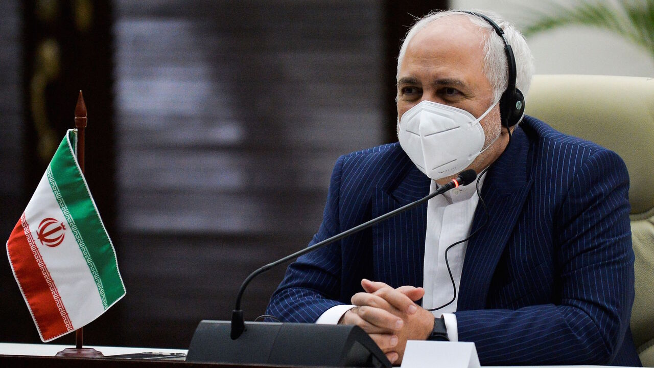 1229494781 The Foreign Minister of the Islamic Republic of Iran, Javad Zarif, speaks during a meeting with his Cuban counterpart Bruno Rodriguez (out of frame), in Havana, on November 6, 2020. - Cuba and Iran's foreign ministers met in Havana on Friday to reinforce their mutual support in the face of crippling US sanctions. (Photo by YAMIL LAGE / AFP) (Photo by YAMIL LAGE/AFP via Getty Images)