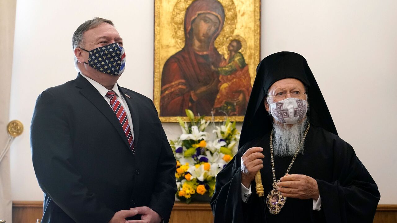 1229648922 US Secretary of State Mike Pompeo (L) listens to Ecumenical Patriarch Bartholomew I, the spiritual leader of the world's Orthodox Christians during a meeting at The Patriarchal Church of St. George in Istanbul on November 17, 2020. (Photo by Patrick Semansky / POOL / AFP) (Photo by PATRICK SEMANSKY/POOL/AFP via Getty Images)