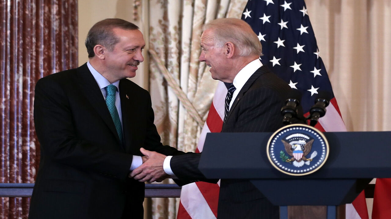 168895143 WASHINGTON, DC - MAY 16: U.S. Vice President Joseph Biden (R) shakes hands with Prime Minister of Turkey Recep Tayyip Erdogan (L) during a luncheon at the State Department May 16, 2013 in Washington, DC. Prime Minister Erdogan was on a visit in Washington and had talks on Syria with U.S. President Barack Obama. (Photo by Alex Wong/Getty Images)