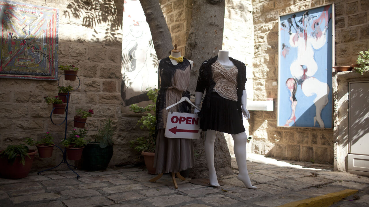 184678680 TEL AVIV, ISRAEL - OCTOBER 09: (ISRAEL OUT) Mannequins are seen at the entrance to a clothing store on October 09, 2013 in Jaffa, a suburb of Tel Aviv, Israel. (Photo by Lior Mizrahi/Getty Images)
