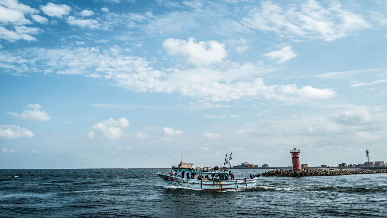 1194821247 A boat sails in the water of the estuary of the Nile river's Damietta branch into the Mediterranean sea in the city of Ras el-Bar in Egypt's northern Damietta Governorate, about 265 kilometres north of the capital, on October 22, 2019. (Photo by Khaled DESOUKI / AFP) (Photo by KHALED DESOUKI/AFP via Getty Images)
