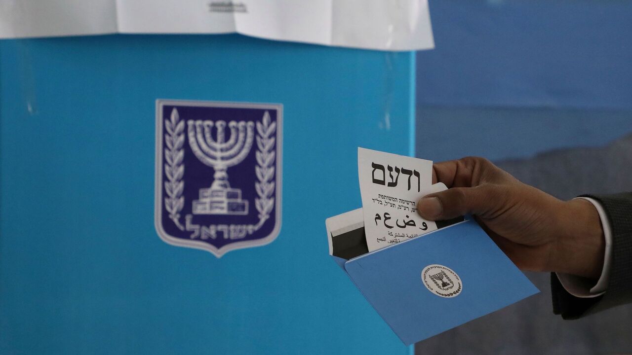 1204593486 Arab Israeli MP and Arab Joint List candidate Said al-Harumi votes in the Bedouin town of Segev Shalom or Shaqib al-Salam near the southern Israeli city of Beersheva on March 2, 2020. - Israelis were voting for a third time in 12 months today, with embattled Prime Minister Benjamin Netanyahu seeking to end the country's political crisis and save his career. (Photo by HAZEM BADER / AFP) (Photo by HAZEM BADER/AFP via Getty Images)