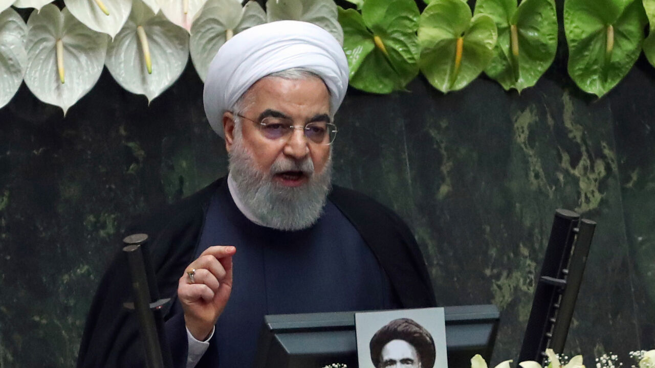 1215439564 Iranian President Hassan Rouhani delivers a speech during the inaugural session of the new parliament following February elections, in Tehran on May 27, 2020. - The 11th legislature since the Islamic revolution of 1979 opened as the country's economy, which has been hard hit by the novel coronavirus, gradually returns to normal. Rouhani, who is in the final year of his second and final term, called on MPs, collectively and individually, to place the "national interest above special interests", "party intere