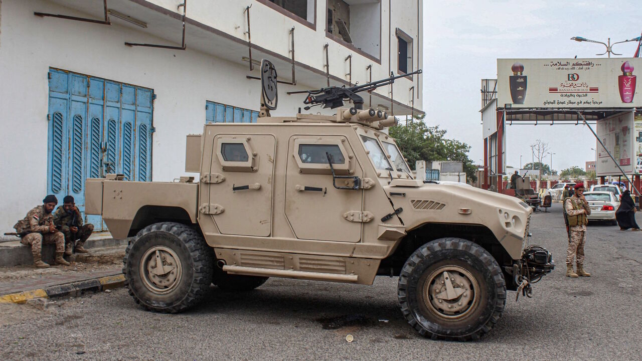 1228223428 Forces loyal to Yemen's Southern Transitional Council (STC) deploy at the entrance of Aden International Airport of the southern Yemeni city on August 27, 2020. - Yemen's southern separatists said on August 26 they had withdrawn from talks over a Saudi-sponsored power-sharing deal with the internationally recognised government, in the latest setback for the troubled process. The plan called for the Yemeni prime minister to form a new government within 30 days, as well as the appointment of a new governor an