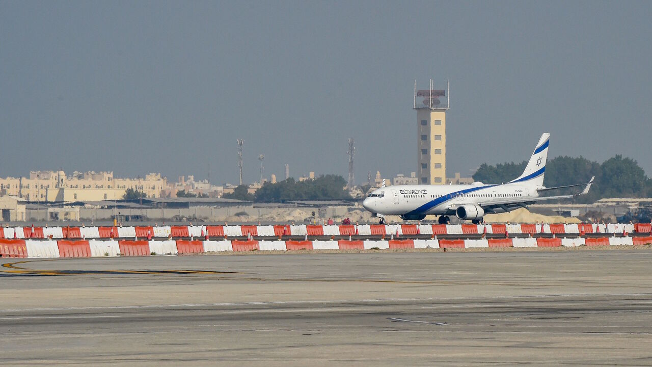 1229144317 The El Al Boeing 737 aircraft carrying the Israeli delegation lands at the Bahrain International Airport on October 18, 2020, to formalise US-brokered normalisation deal between the two states. - Israel and Bahrain will officially establish diplomatic relations at a ceremony in Manama, an Israeli official said, after the two states reached a US-brokered normalisation deal last month. (Photo by Mazen Mahdi / AFP) (Photo by MAZEN MAHDI/AFP via Getty Images)