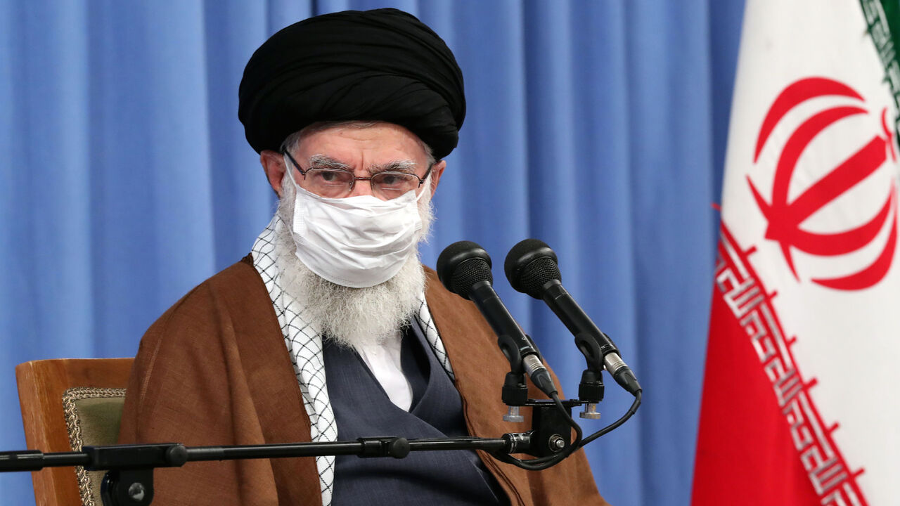 1229247599 A handout picture provided by the office of Iran's Supreme Leader Ayatollah Ali Khamenei on October 24, 2020, shows him wearing a protective face mask as he gives a speech in the capital Tehran during a meeting of the national staff to discuss the issue of the novel coronavirus pandemic crisis. (Photo by - / KHAMENEI.IR / AFP) / XGTY / === RESTRICTED TO EDITORIAL USE - MANDATORY CREDIT "AFP PHOTO / HO / KHAMENEI.IR" - NO MARKETING NO ADVERTISING CAMPAIGNS - DISTRIBUTED AS A SERVICE TO CLIENTS === (Photo by