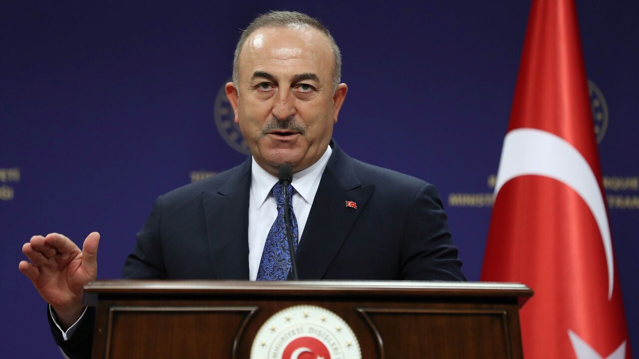 1230008307 Turkish Foreign minister Mevlut Cavusoglu gives a press conference with his Hungarian counterpart following their meeting in Ankara, on December 8, 2020. (Photo by Adem ALTAN / AFP) (Photo by ADEM ALTAN/AFP via Getty Images)