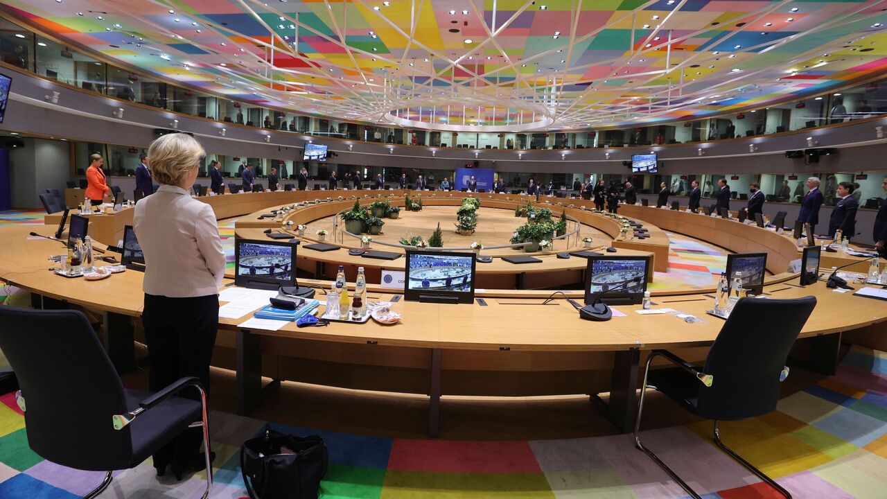 1230046343 President of the European Commission Ursula von der Leyen (1st-L) and EU leaders observe a minute silent in tribute to late French President Valery Giscard d'Estaing prior to a round table meeting during an EU summit at the European Council building in Brussels, on December 10, 2020. - European Union leaders meet for a year-end summit that will address anything from climate, sanctions against Turkey to budget and virus recovery plans. Brexit will be discussed on the sidelines. (Photo by Olivier Matthys / PO