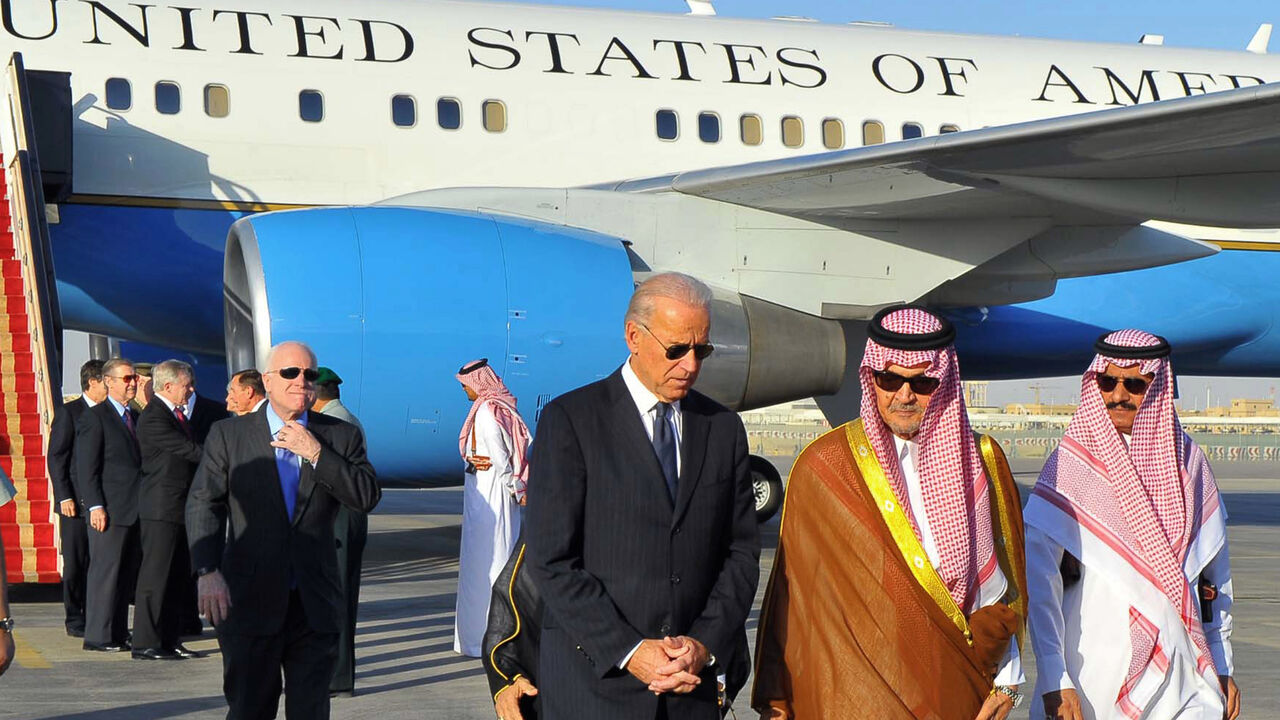 130620634 Saudi Foreign Minister Prince Saud al-Faisal (2nd R) welcomes US Vice President Joe Biden (C) at the Riyadh airbase on October 27, 2011, upon his arrival in the Saudi capital with a US official delegation to offer condolences to the King Abdullah bin Abdul Aziz following the death of his brother, Crown Prince Sultan. AFP PHOTO/STR (Photo credit should read -/AFP via Getty Images)