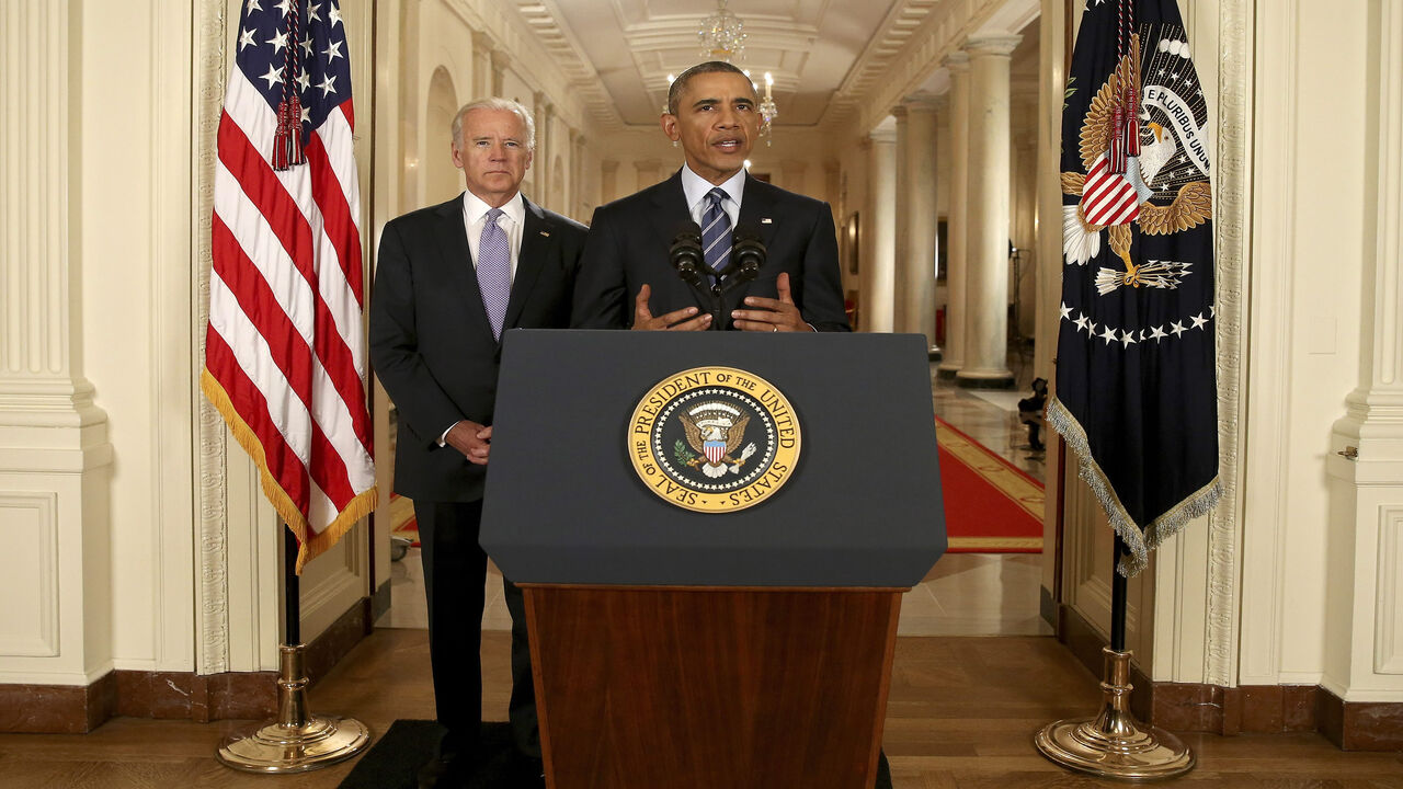 480656612 WASHINGTON, DC - JULY 14: President Barack Obama, standing with Vice President Joe Biden, conducts a press conference in the East Room of the White House in response to the Iran Nuclear Deal, on July 14, 2015 in Washington, DC. The landmark deal will limit Iran's nuclear program in exchange for relief from international sanctions. The agreement, which comes after almost two years of diplomacy, has also been praised by Iranian President Hassan Rouhani. (Photo by Andrew Harnik - Pool/Getty Images)