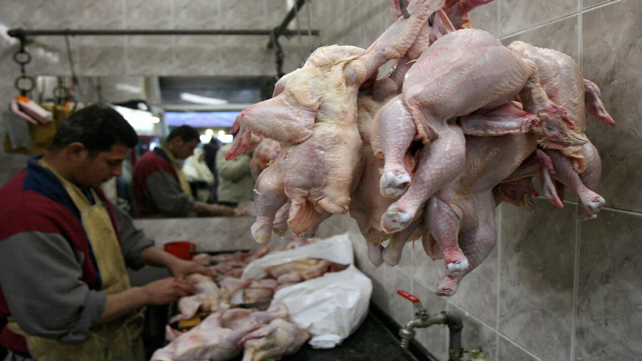 78825119 A Palestinian vendor cleans chicken at his shop in the West Bank city of Ramallah, 06 January 2008. Palestenian Health Minister Fathi Mughli said today Palestinians should be vigilant after a case of H5N1 strain of bird flu that is dangerous to humans was detected in the northern Israeli town of Binyamina on the Mediterranean coast. AFP PHOTO/ABBAS MOMANI (Photo credit should read ABBAS MOMANI/AFP via Getty Images)