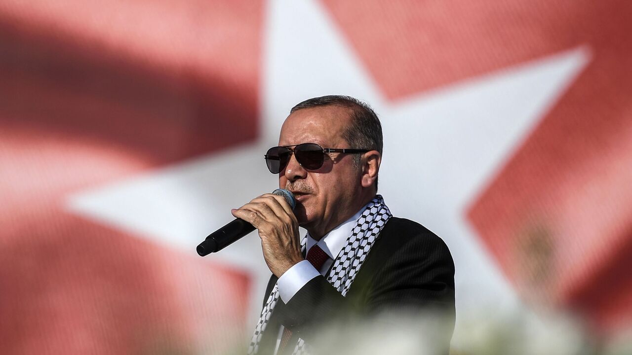959882846 Turkish President Recep Tayyip Erdogan addresses a protest rally in Istanbul on May 18, 2018, against the recent killings of Palestinian protesters on the Gaza-Israel border and the US embassy move to Jerusalem. (Photo by OZAN KOSE / AFP) (Photo by OZAN KOSE/AFP via Getty Images)