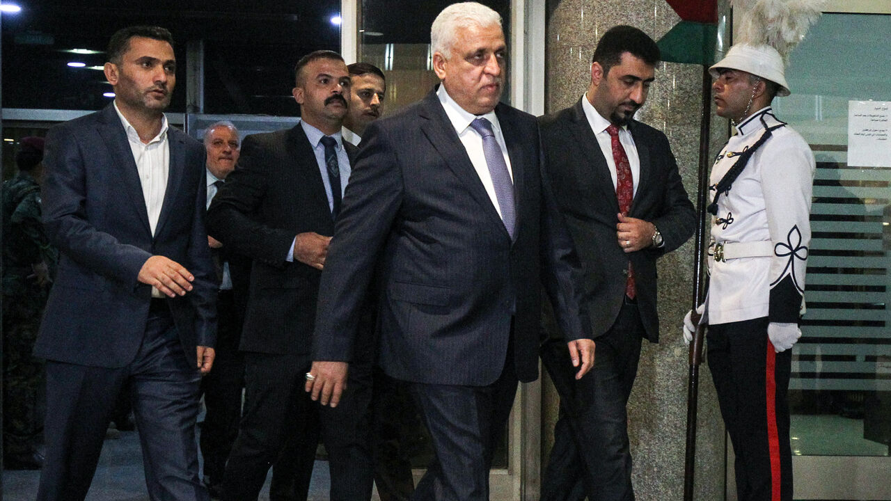 1052947994 Falih al-Fayadh, Iraq's interior minister candidate arrives at parliament headquarters in the capital Baghdad on October 24, 2018, prior to a vote on the new proposed cabinet. (Photo by AHMAD AL-RUBAYE / AFP) (Photo credit should read AHMAD AL-RUBAYE/AFP via Getty Images)