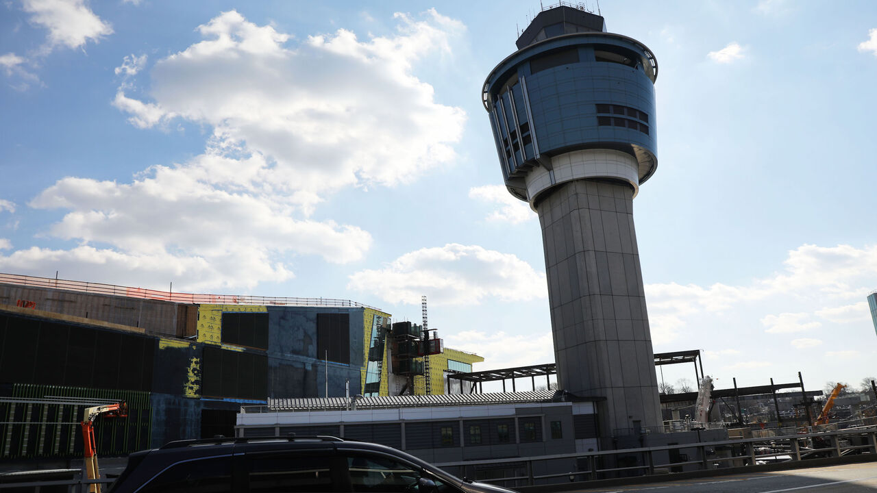1124784682 NEW YORK, NEW YORK - JANUARY 25: One of the control towers stands at LaGuardia Airport after the Federal Aviation Administration (FAA) announced it is delaying flights into multiple airports due to staffing concerns related the government shutdown on January 25, 2019 in the Queens borough of New York City. After unions representing air traffic controllers, pilots, and flight attendants recently warned of a growing concern for the safety of both traveling passengers and employees due to the continued governm