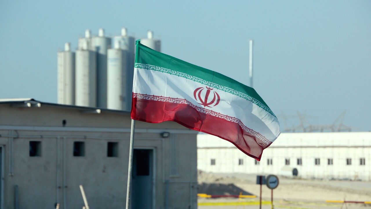 1181344604 A picture taken on November 10, 2019, shows an Iranian flag in Iran's Bushehr nuclear power plant, during an official ceremony to kick-start works on a second reactor at the facility. - Bushehr is Iran's only nuclear power station and is currently running on imported fuel from Russia that is closely monitored by the UN's International Atomic Energy Agency. (Photo by ATTA KENARE / AFP) (Photo by ATTA KENARE/AFP via Getty Images)