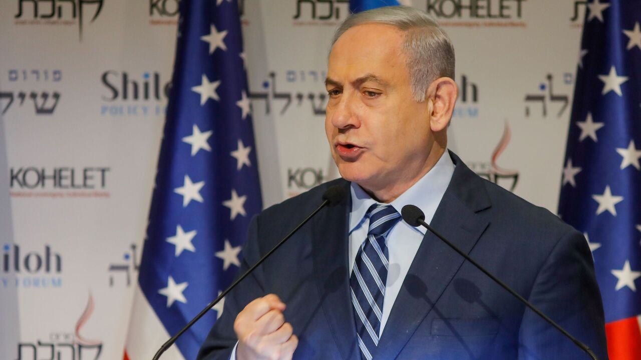 1192534301 TOPSHOT - Isreali Prime Minister Benjamin Netanyahu speaks at the Kohelet Policy Forum conference in Jerusalem, on January 8, 2020. - Netanyahu today warned Israel would strike a "resounding blow" if attacked by arch foe Iran, as regional tensions spike after the US killing of military commander Qasem Soleimani. (Photo by MENAHEM KAHANA / AFP) (Photo by MENAHEM KAHANA/AFP via Getty Images)