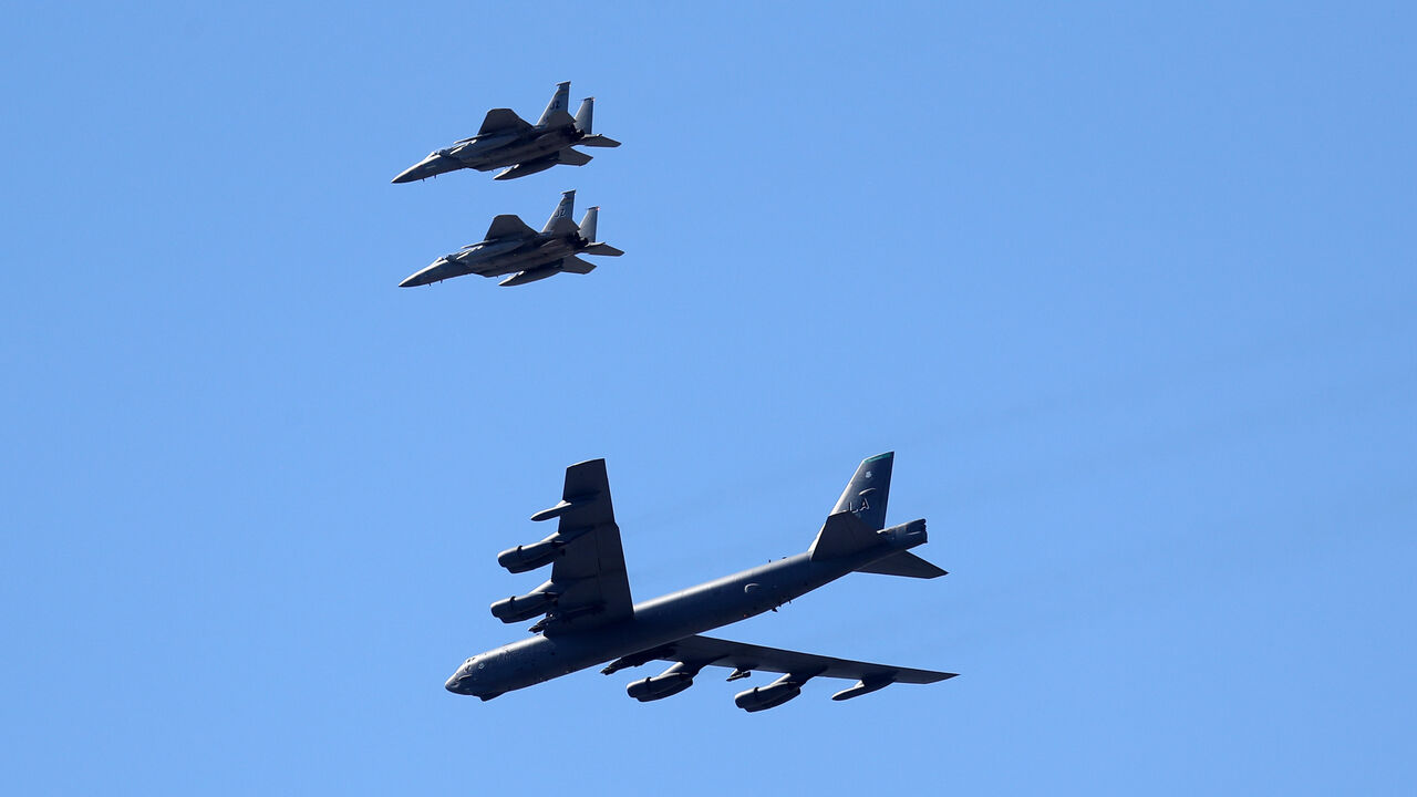 1222236357 NEW ORLEANS, LOUISIANA - MAY 01: Two B-52 Bombers and two F-15 fighter jets fly over the University Medical Center on May 01, 2020 in New Orleans, Louisiana. The flyover was done as a salute to first responders and hospital workers in some of the hardest hit areas of the coronavirus (COVID-19). (Photo by Chris Graythen/Getty Images)